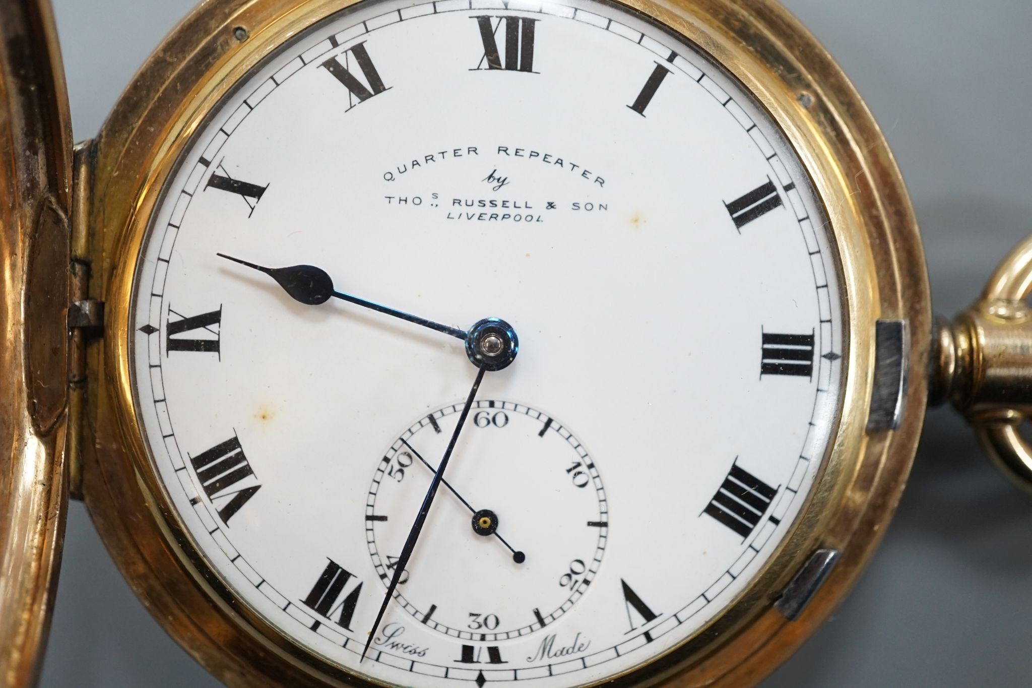 An early 20th century gold plated quarter repeating hunter keyless pocket watch by Thomas Russell & Son, Liverpool, with Roman dial and subsidiary seconds, case diameter 57mm.